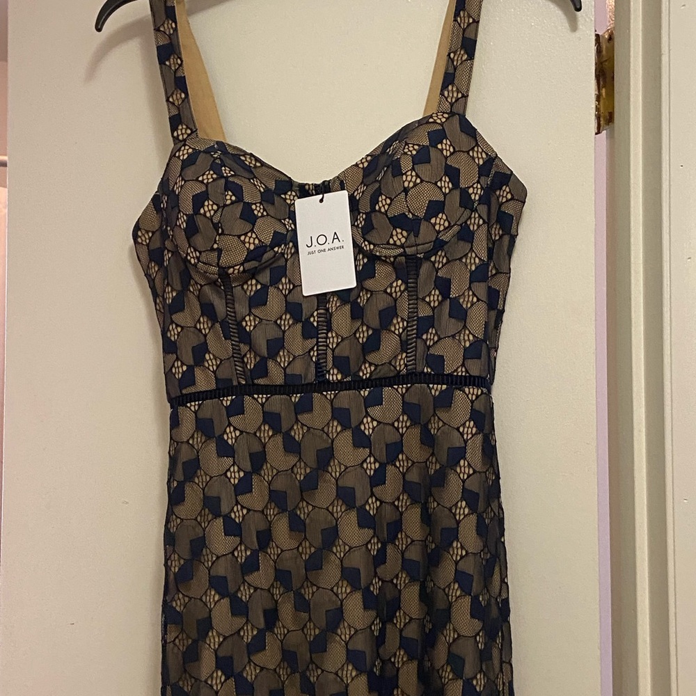 Brand new women’s dress, built in bra cups